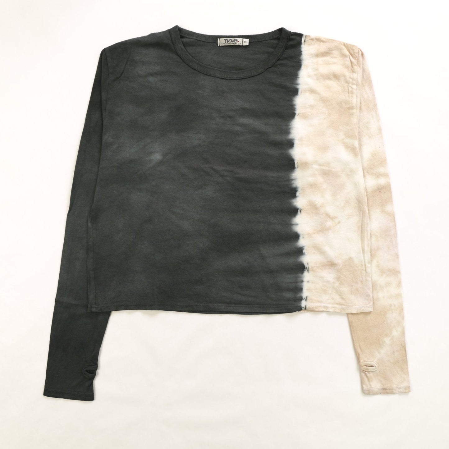 looser-fit women's long sleeve shirt in graphite and mocha tie-dye splotches and thumbholes at the end of the sleeves