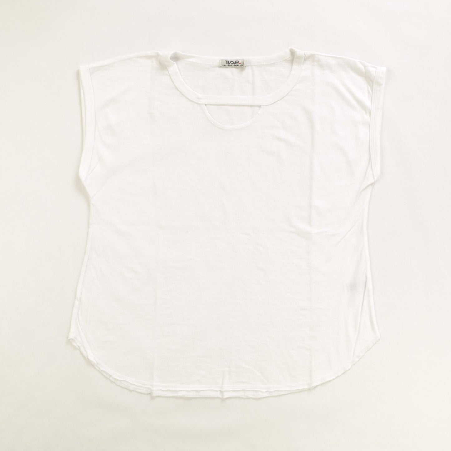 women's white extremely short sleeve shirt with round bottom and half-circle keyhole under the neckline