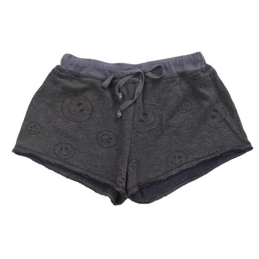 women's navy with black happy faces printed all over wide-legged shorts with raw hemming at pant leg ends, and thick waistband with the drawstring at the front tied into a bow