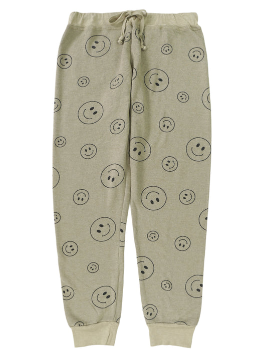 women's olive green with black happy faces printed all over sweatpants with elastic cuffs at the ends of the pant legs and drawstring tied into a bow at the front of the waistband