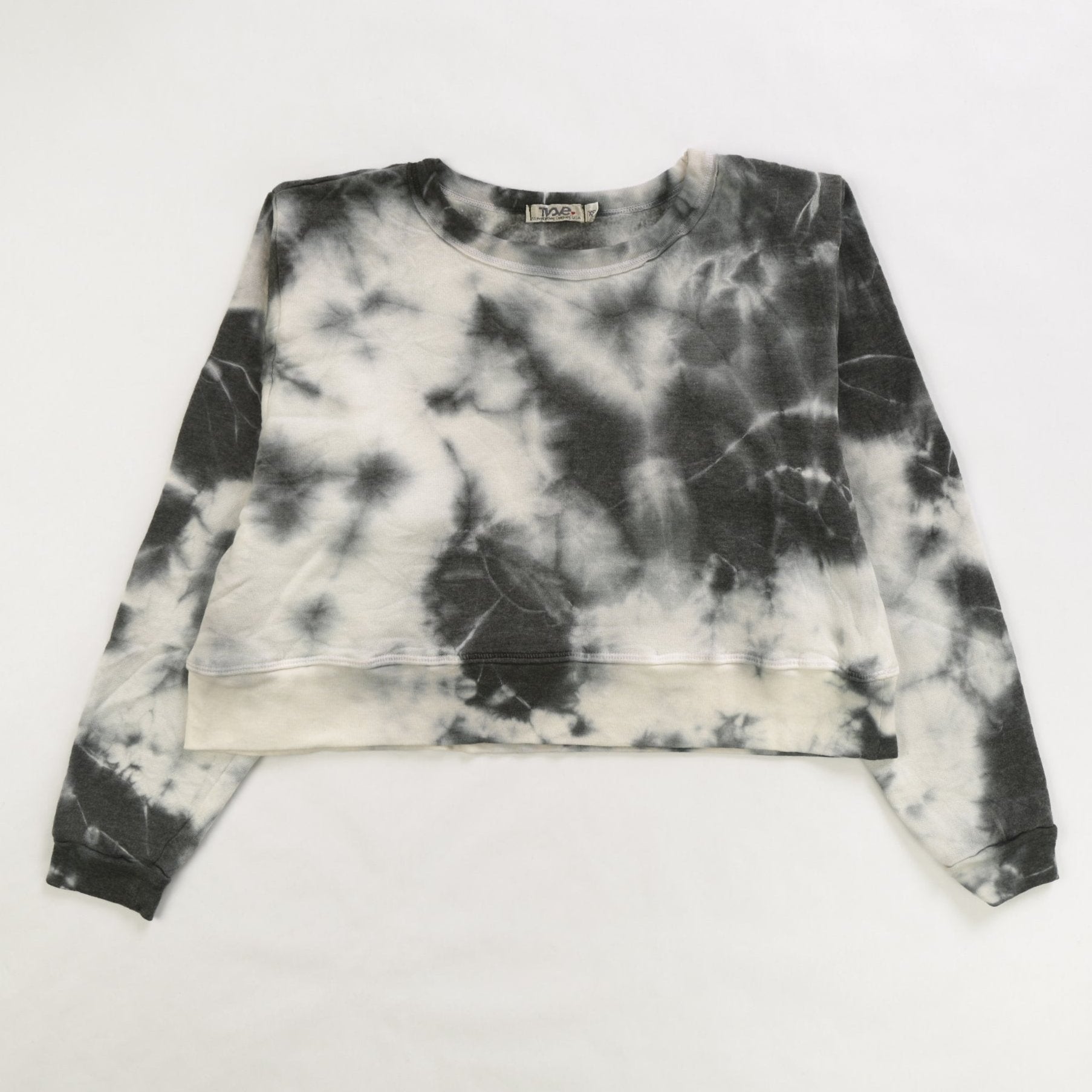 women's black tie-dye splotches on white fabric shorter-length sweater