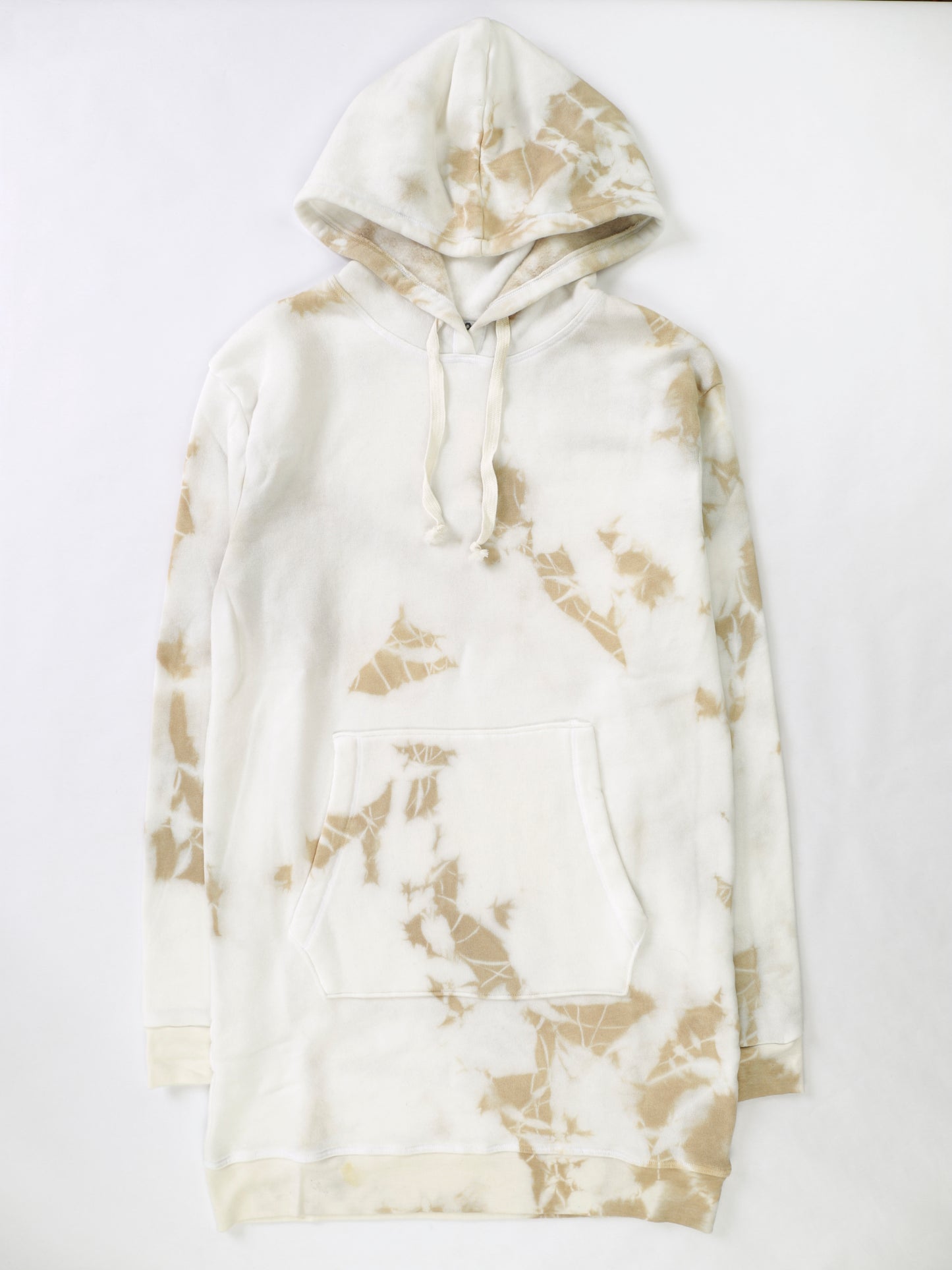 women's tan tie-dye splotches on white fabric oversized tunic-like hoodie sweater with drawstrings from the hood and front pouch pocket