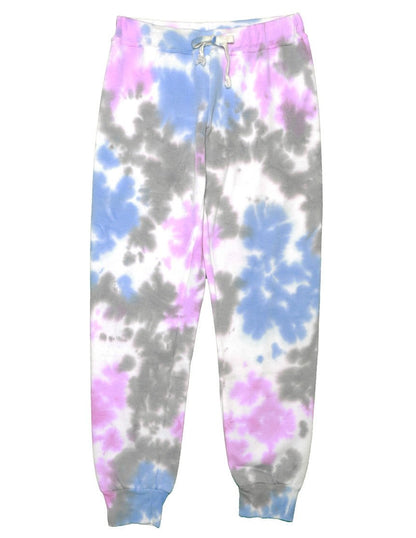 women's blue, pink, and gray tie-dye splotches on white fabric sweatpants with elastic cuffs at the ends of the pant legs and drawstring tied into a bow at the front of the waistband