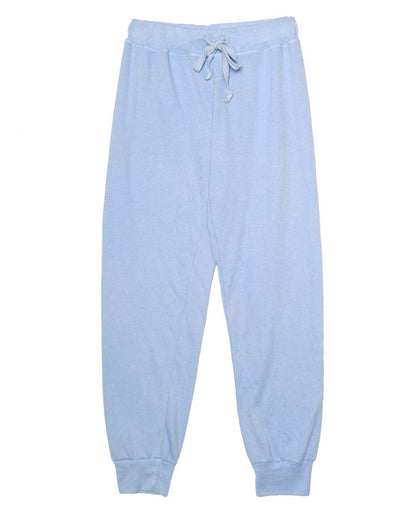 women's light blue sweatpants with elastic cuffs at the ends of the pant legs and drawstring tied into a bow at the front of the waistband