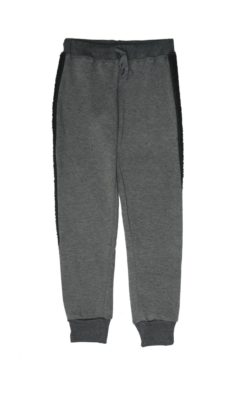 women's black sweatpants with elastic cuffs at the ends of the pant legs and drawstring tied into a bow at the front of the waistband with reversed fuzzy fabric trim down the outer-sides of the pant legs